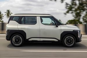 Driving: Side Profile (Right) View Image of Syros EV