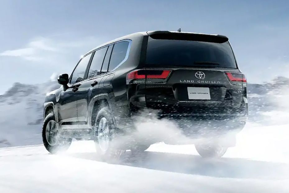 Driving: Rear Left Three Quarter View Image of Land Cruiser 300
