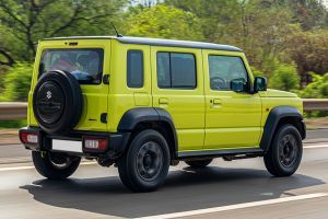 Driving: Rear Right Three Quarter View Image of Jimny