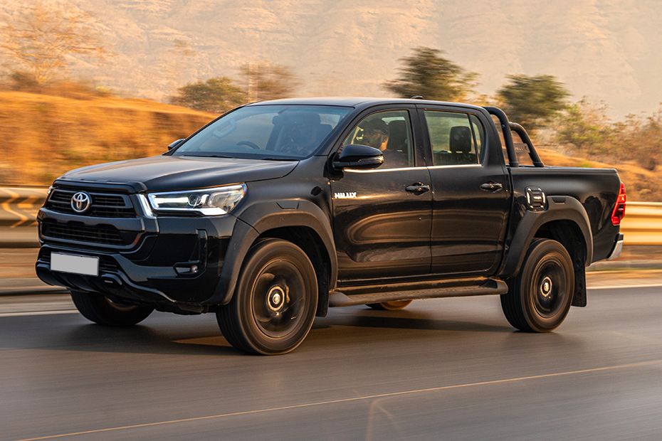 Driving: Front Left Quarter View Image of Hilux