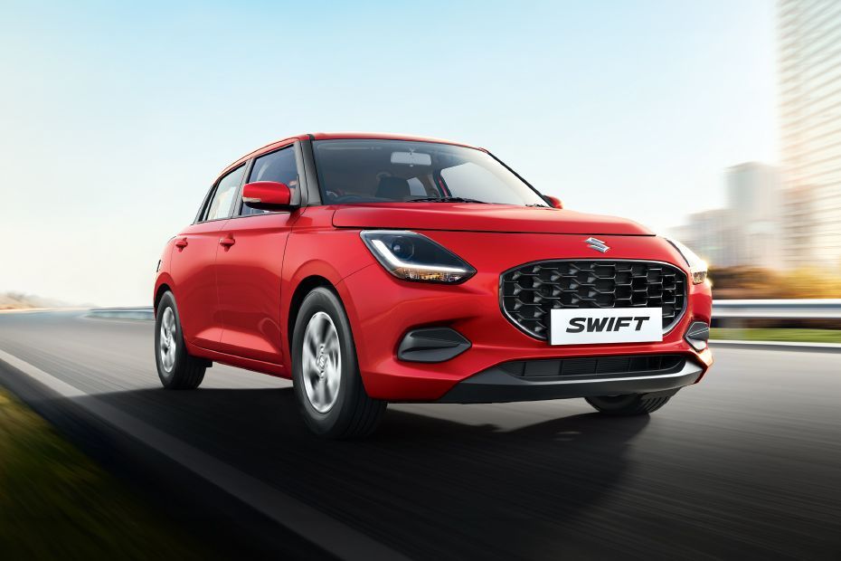 Driving: Front Right Quarter View Image of Swift