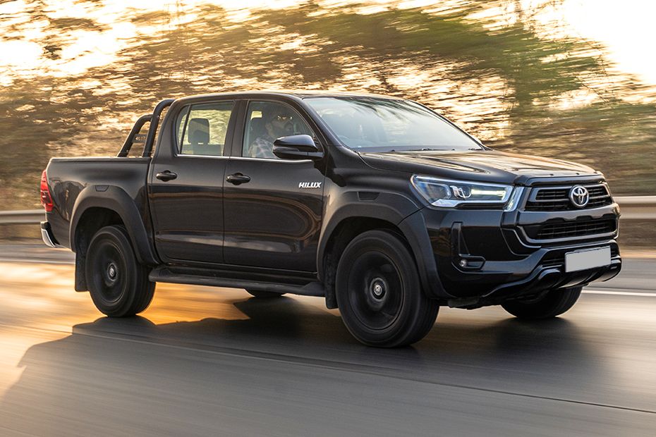 Driving: Front Right Quarter View Image of Hilux