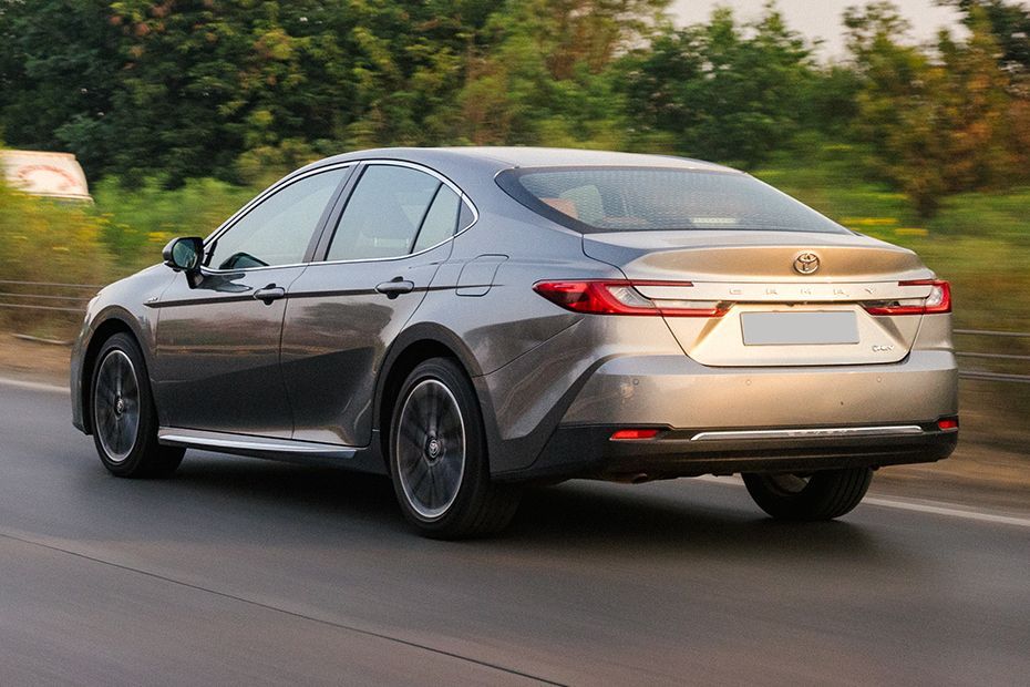 Driving: Rear Left Three Quarter View Image of Camry