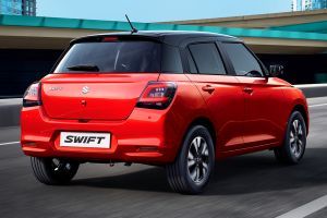 Driving: Rear Right Three Quarter View Image of Swift