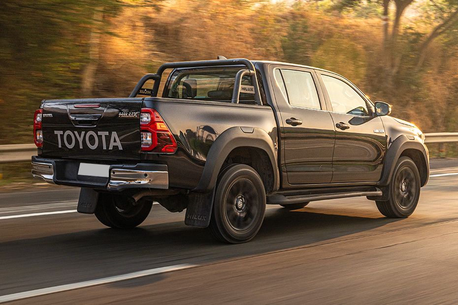 Driving: Rear Right Three Quarter View Image of Hilux