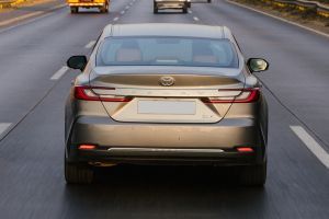 Driving: Rear View Image of Camry