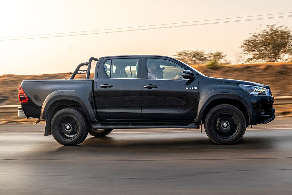 Driving: Side Profile Right View Image of Hilux
