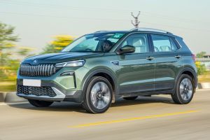Driving: Front Left Quarter View Image of Kushaq