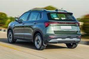 Driving: Rear Left Three Quarter View Image of Kushaq