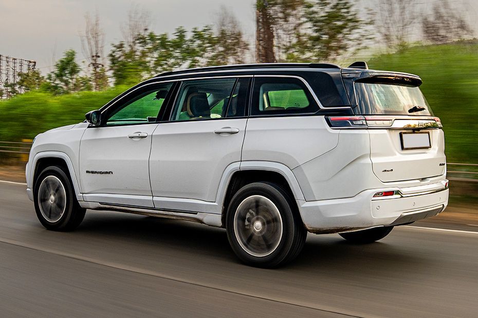 Driving: Rear Left Three Quarter View Image of Meridian