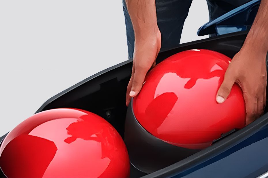Under seat storage of iQube
