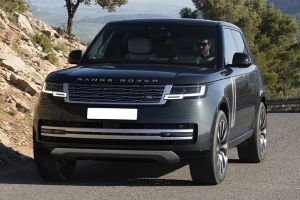 Driving: Front Left Quarter View Image of Range Rover Electric