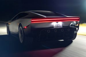 Driving: Rear Left Three Quarter View Image of Roadster