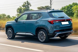 Driving: Rear Left Three Quarter View Image of Elevate