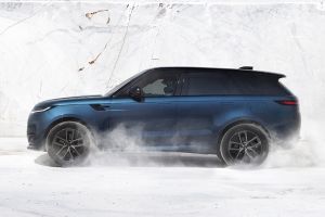 Driving: Side Profile (Left) View Image of Range Rover Sport Electric