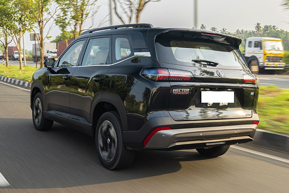 Driving: Rear Left Three Quarter View Image of Hector Tomahawk EV