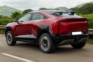 Driving: Rear Left Three Quarter View Image of BE 6