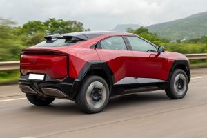 Driving: Rear Right Three Quarter View Image of BE 6