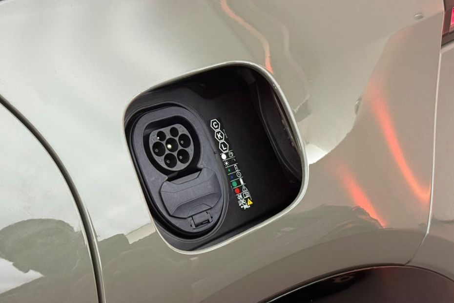 Charging Flap (Open) Image of Cayenne Electric
