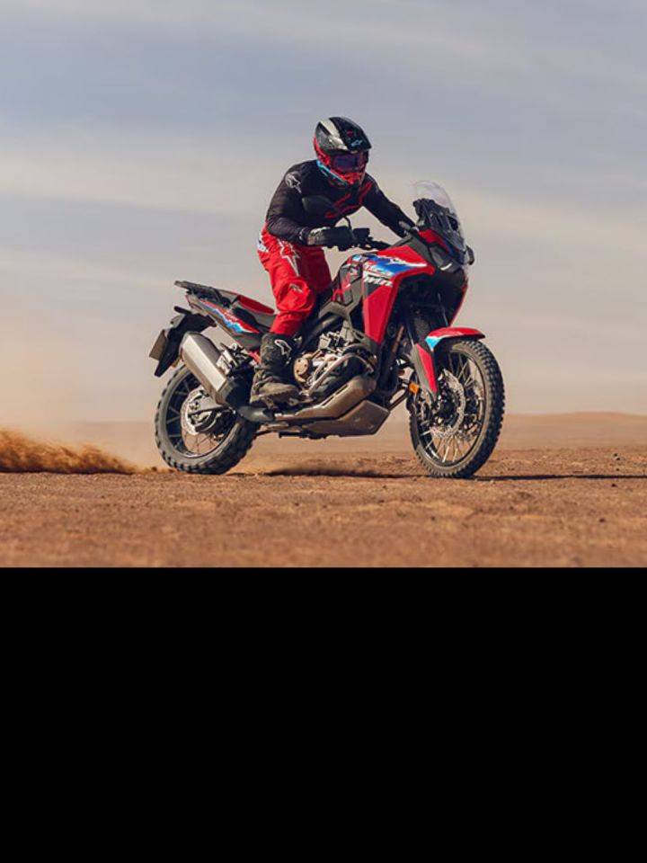 Honda has unveiled 2025 Honda Africa Twin models. The updated models have received new colour schemes & graphics